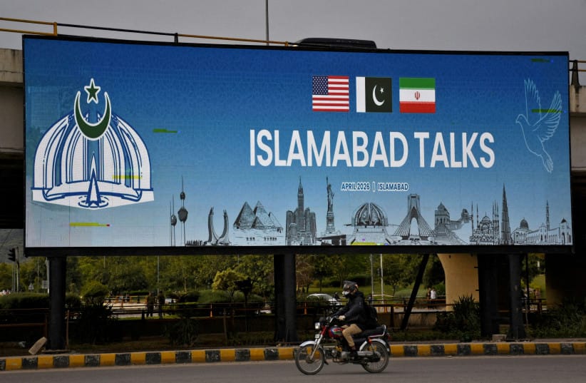 A man rides his motorbike past a billboard installed alongside a road as Pakistan prepares to host the U.S. and Iran for peace talks, in Islamabad, Pakistan, April 10, 2026. (credit: WASEEM KHAN/REUTERS) A man rides his motorbike past a billboard installed alongside a road as Pakistan prepares to host the U.S. and Iran for peace talks, in Islamabad, Pakistan, April 10, 2026. (credit: WASEEM KHAN/REUTERS)