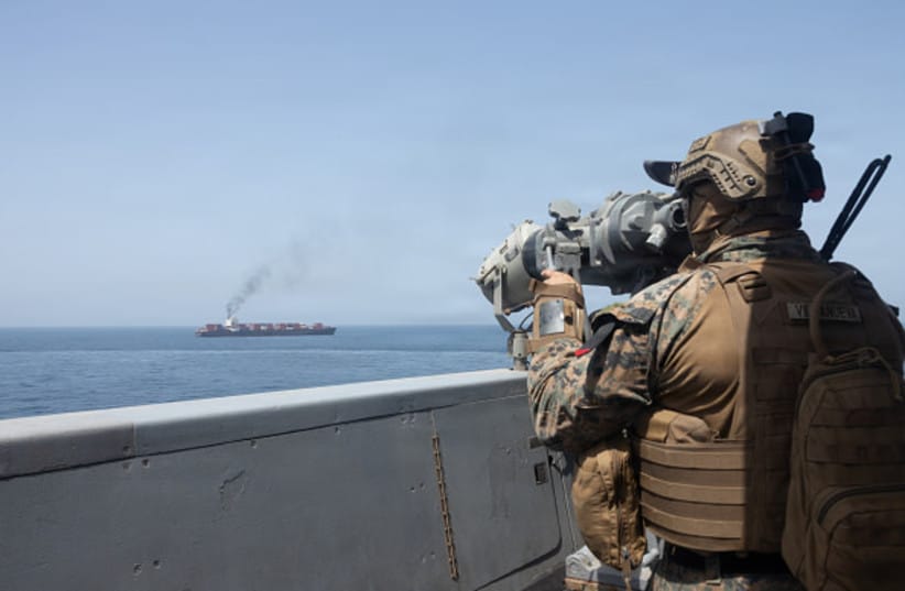 U.S. forces patrol the Arabian Sea near M/V Touska on April 20, 2026, after firing upon the Iranian-flagged vessel that the U.S. accused of attempting to violate the U.S. naval blockade of Iranian ports near the Strait of Hormuz. (credit:  U.S. Navy via Getty Images)