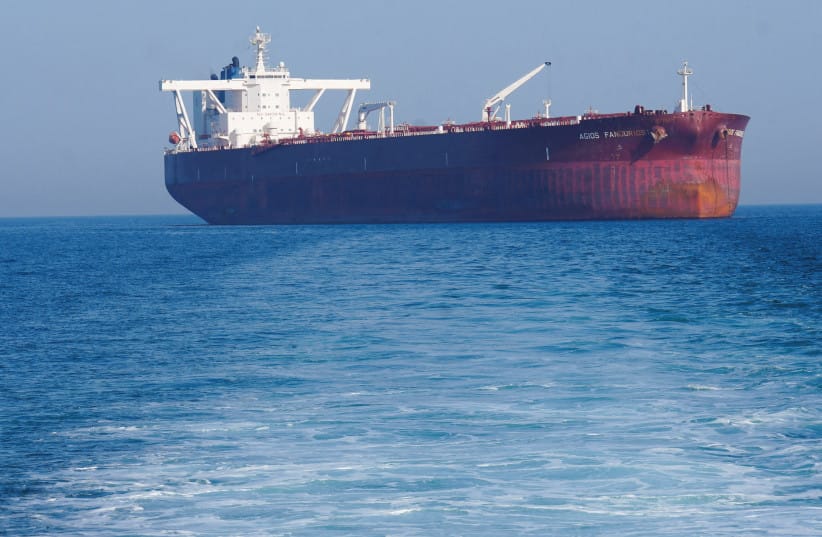 The Malta-flagged tanker Agios Fanourios I, an oil tanker that sailed through the Strait of Hormuz, arrives in Iraq?s territorial waters off Basra,Iraq April 17, 2026.  (credit: REUTERS/Mohammed Aty/File Photo)