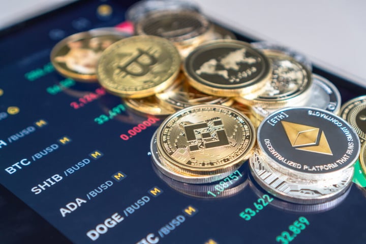 Bitcoin Reclaims $77,000, Ethereum, XRP, Dogecoin Bump 1%