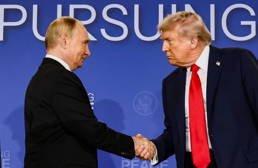US President Donald Trump and Russian President Vladimir Putin shake hands during a press conference following their meeting to negotiate an end to the war in Ukraine, at Joint Base Elmendorf-Richardson, in Anchorage, Alaska, US, August 15, 2025.  (credit: REUTERS/KEVIN LAMARQUE)
