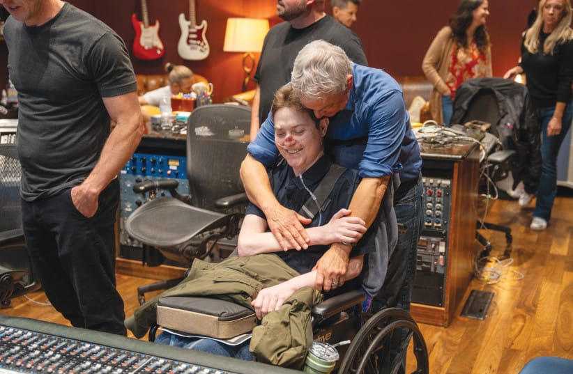 With Son Mac during a recording session. (credit: Courtesy Gary Sinise)