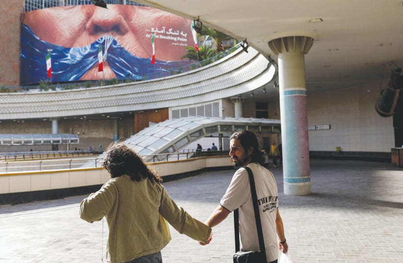 Anti-US billboard depicts President Donald Trump and the Strait of Hormuz, in Tehran, May 17.   (credit: Majid Asgaripour/WANA via Reuters)