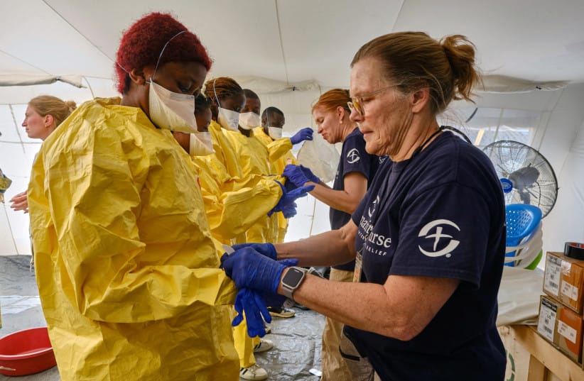 Aid agencies intensify efforts to contain the Ebola outbreak caused by the Bundibugyo virus, in Bunia town, Ituri province, Democratic Republic of Congo, June 11, 2026.  (credit: REUTERS/Gradel Muyisa Mumbere)