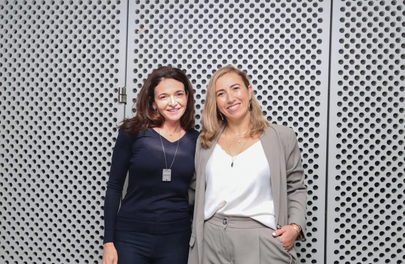 Sheryl Sandberg, Civil Commission advisory board member and Lean-In.org CEO, with Elkayam-Levy at the screening of the documentary 'Screams Before Silence,' at the Simon Wiesenthal Center, Los Angeles. (credit: COCHAV ELKAYAM-LEVY) Sheryl Sandberg, Civil Commission advisory board member and Lean-In.org CEO, with Elkayam-Levy at the screening of the documentary 'Screams Before Silence,' at the Simon Wiesenthal Center, Los Angeles. (credit: COCHAV ELKAYAM-LEVY)