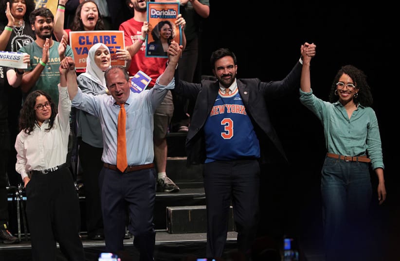 CONGRESSIONAL CANDIDATE Claire Valdez, Congressional candidate Brad Lander, Mayor Zohran Mamdani, and Congressional candidate Darializa Avila Chevalier raise their hands during a Get Out the Vote (GOTV) rally at King's Theater on June 18, 2026 in New York City.  (credit: MICHAEL M. SANTIAGO/GETTY IMAGES)