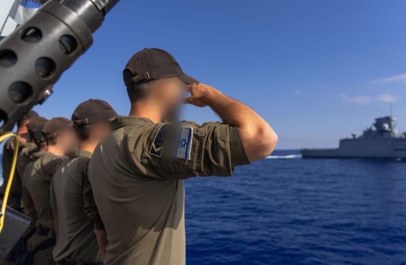 Israel Navy soldiers salute as a German Navy vessel sails past during a visit to Haifa Naval Base, published June 25, 2026. (credit: IDF SPOKESPERSON'S UNIT) Israel Navy soldiers salute as a German Navy vessel sails past during a visit to Haifa Naval Base, published June 25, 2026. (credit: IDF SPOKESPERSON'S UNIT)