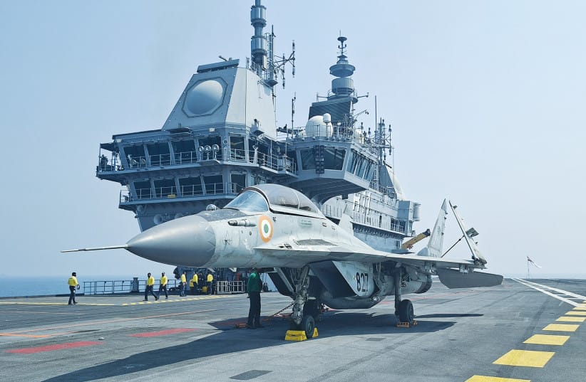 A MIG-29K fighter jet sits on the flight deck of India’s aircraft carrier ‘INS Vikrant’ during the International Fleet Review 2026 off the coast of Visakhapatnam, India. (credit: ALEX WINSTON) A MIG-29K fighter jet sits on the flight deck of India’s aircraft carrier ‘INS Vikrant’ during the International Fleet Review 2026 off the coast of Visakhapatnam, India. (credit: ALEX WINSTON)