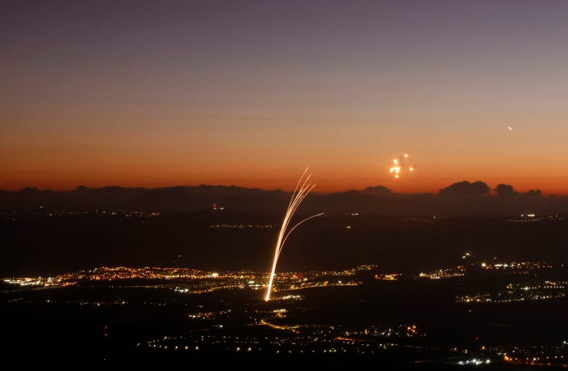 Rockets fired from southern Lebanon are intercepted by Israel's Iron Dome air defence system over the Upper Galilee region in northern Israel on August 23, 2024. (credit: JALAA MAREY/AFP VIA GETTY IMAGES)