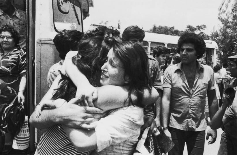 A FREED Israeli hostage is greeted upon her return to Israel after the Entebbe raid on July 3 (credit: Keystone/Hulton Archive/Getty Images) A FREED Israeli hostage is greeted upon her return to Israel after the Entebbe raid on July 3 (credit: Keystone/Hulton Archive/Getty Images)