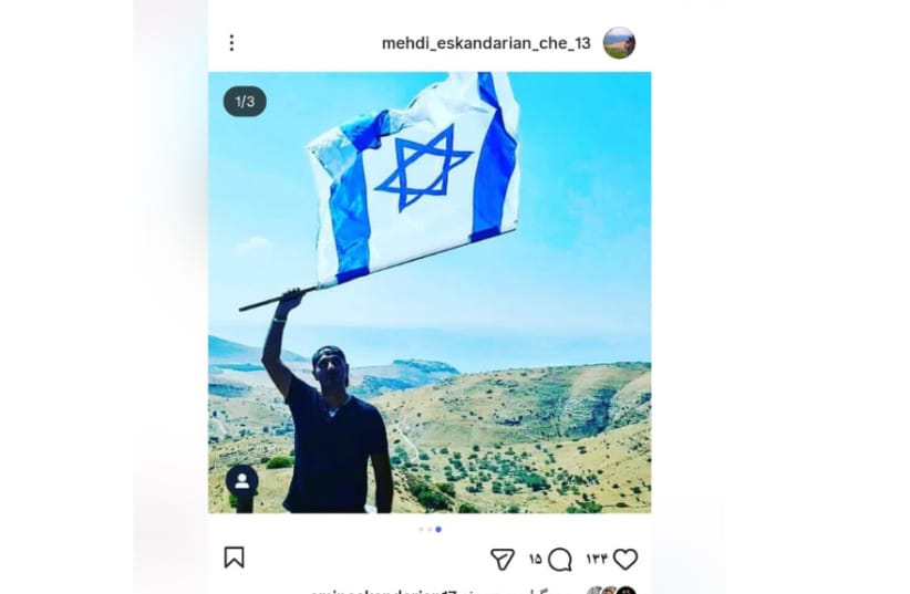 Mehdi Eskandarian poses with the Israeli flag in a post on Instagram. (credit: Courtesy of Mohammed Eskandarian) Mehdi Eskandarian poses with the Israeli flag in a post on Instagram. (credit: Courtesy of Mohammed Eskandarian)