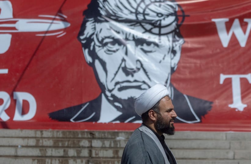 People pass a large banner depicting U.S. President Donald Trump with a target on his head, during funeral ceremonies for Iran's slain Supreme Leader, Ayatollah Ali Khamenei, at the Grand Mosalla on July 5, 2026 in Tehran, Iran. (credit: Majid Saeedi/Getty Images) People pass a large banner depicting U.S. President Donald Trump with a target on his head, during funeral ceremonies for Iran's slain Supreme Leader, Ayatollah Ali Khamenei, at the Grand Mosalla on July 5, 2026 in Tehran, Iran. (credit: Majid Saeedi/Getty Images)