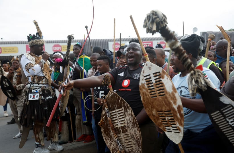 Supporters of the South African anti-immigrant group 'March and March' hold a demonstration, after an unofficial June 30 deadline set by anti-immigrant groups for undocumented migrants to leave the country had passed, in Umzimkhulu, South Africa, July 13, 2026. (credit: REUTERS/Rogan Ward)