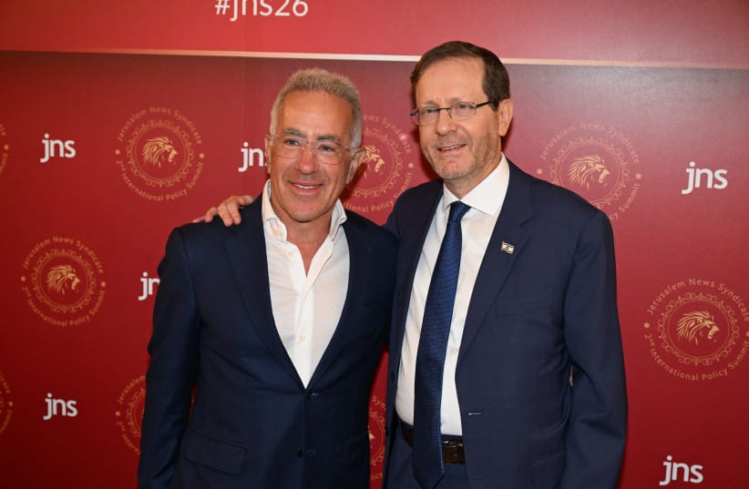 With President Isaac Herzog at the JNS International Summit last month.  (credit: Kobi Kuanks - JNS)