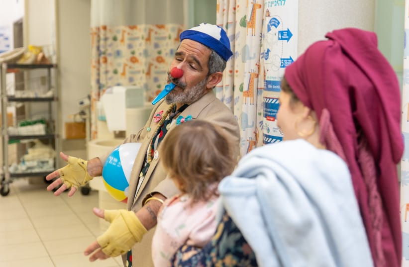 Dush the medical clown visits patients hospitalized at Hadassah Ein Karem hospital in Jerusalem on March 15, 2026. (credit: Dor Pazuelo/Flash90) Dush the medical clown visits patients hospitalized at Hadassah Ein Karem hospital in Jerusalem on March 15, 2026. (credit: Dor Pazuelo/Flash90)