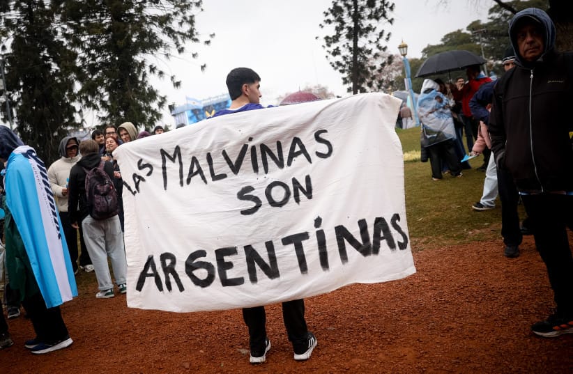 An Argentina fans holds a sign reading ''Las Malvinas son Argentinas'' as they gather to watch the FIFA World Cup 2026 final between Spain and Argentina on July 19, 2026 in Buenos Aires. (credit: Roberto Tuero/Getty Images) An Argentina fans holds a sign reading ''Las Malvinas son Argentinas'' as they gather to watch the FIFA World Cup 2026 final between Spain and Argentina on July 19, 2026 in Buenos Aires. (credit: Roberto Tuero/Getty Images)