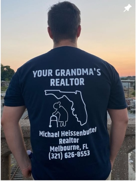 Man wearing shirt with logo, contact information and words 
