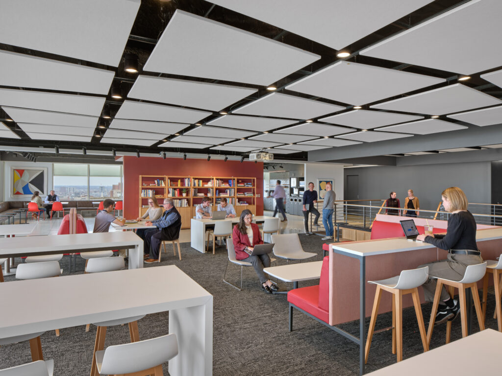 What distinguishes high-performing compact offices is not the number of amenities but their relevance. When features align closely with how employees actually work &ndash; eating lunch, plugging in quickly, meeting informally &ndash; they enhance satisfaction while preserving valuable space. In one workplace, a cafe designed to support multiple functions illustrates this approach. 