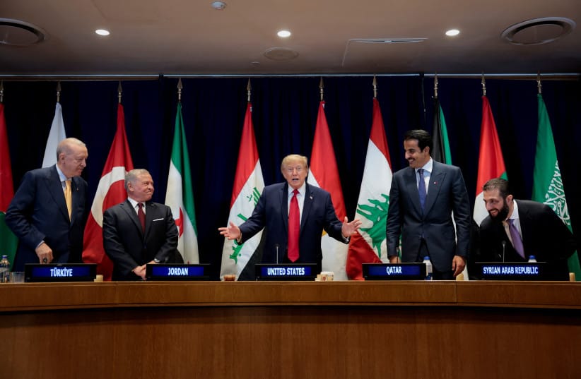 US President Donald Trump, flanked by Turkish President Recep Erdogan, Jordan's King Abdullah II, Qatar's Emir Sheikh Tamim bin Hamad Al Thani and Syria's President Ahmed al-Sharaa, gestures during a multilateral meeting with leaders from the Gulf Cooperation Council, which includes the United Arab  (credit: Reuters/Kylie Cooper)