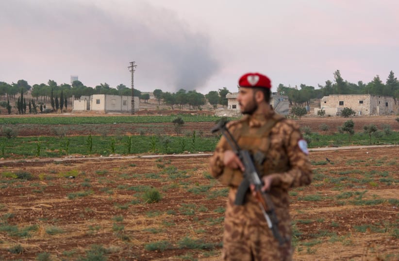 A military police officer stands on a road following an explosion at a weapons depot in the Al-Eis area, in the southern countryside of Aleppo, Syria, September 21, 2026. (credit: REUTERS/KARAM AL-MASRI) A military police officer stands on a road following an explosion at a weapons depot in the Al-Eis area, in the southern countryside of Aleppo, Syria, September 21, 2026. (credit: REUTERS/KARAM AL-MASRI)