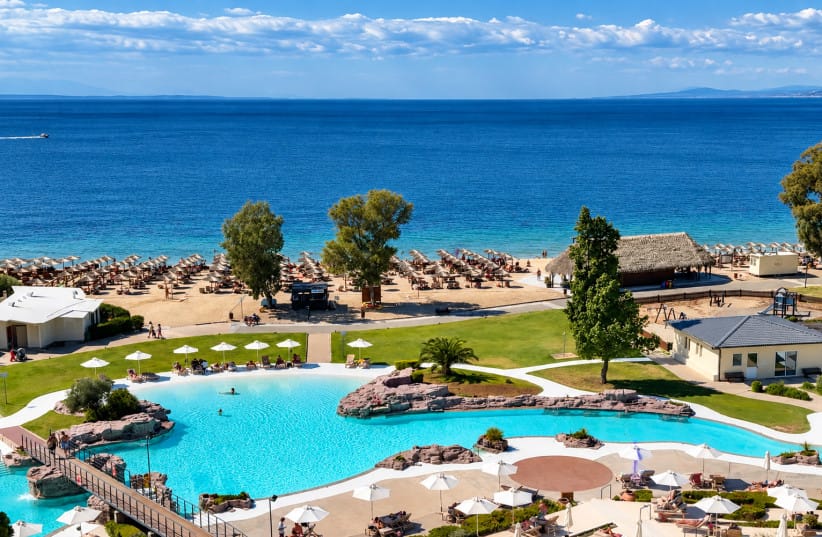 A FAMILY RESORT with four swimming pools and remarkably clear and calm waters along Porto Carras’s nine-kilometer coastline. (credit: MOTTI VERSES) A FAMILY RESORT with four swimming pools and remarkably clear and calm waters along Porto Carras’s nine-kilometer coastline. (credit: MOTTI VERSES)