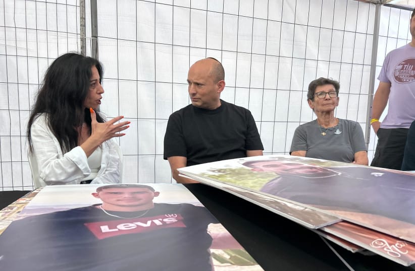 FROM LEFT: Einav Zangauker, former PM Naftali Bennett, and former Hamas hostage Yocheved Lifchitz sit in the Sukkah of Failure on September 29, 2026.  (credit: AVSHALOM SASSONI/MAARIV)