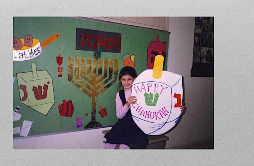 The author celebrates Hanukkah at her Jewish school in Queens, New York. (credit: Courtesy)