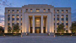 Stone office building exterior at dusk