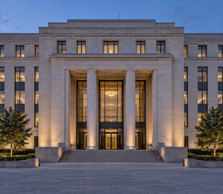 Stone office building exterior at dusk