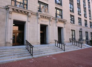 Archive: main entrance to GSA headquarters at1800 F Street NW, Washington, February10,2025. G. Edward Johnson, CC BY4.0, resized.