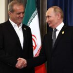 Archive photo: Masoud Pezeshkian and Vladimir Putin shake hands at the September 1, 2025 SCO summit, not today's meeting.