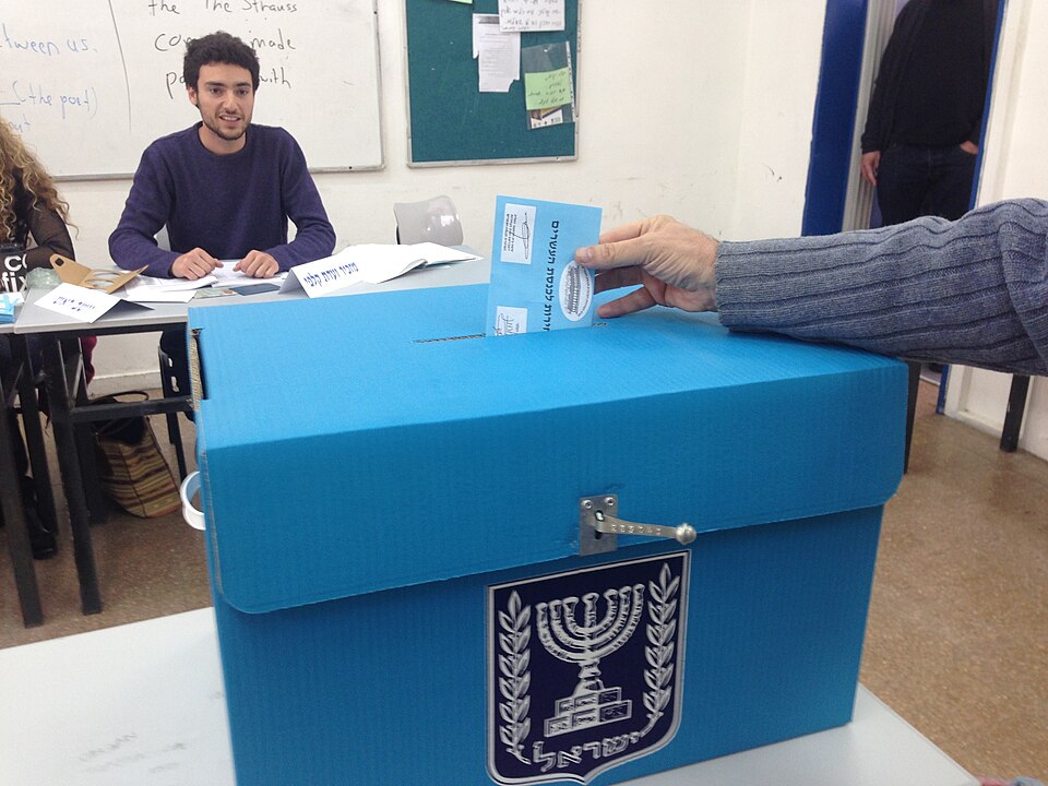 Israeli ballot box in a 2015 archive photograph by Heinrich-Böll-Stiftung, CC BY-SA 2.0. Not the current count.