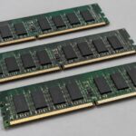 Computer memory modules on a gray surface