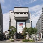 Archive: Tokyo Stock Exchange main building with JPX banner, October 2018. Photo Kakidai, CC BY-SA 4.0, resized.