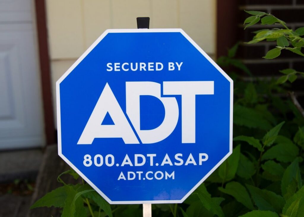 Blue ADT security yard sign, from ADT's media library.