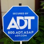 Blue ADT security yard sign, from ADT's media library.