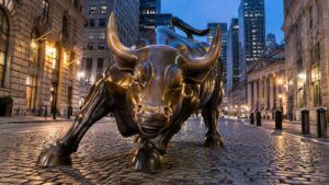 The Charging Bull statue near Wall Street at dawn