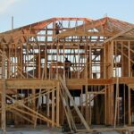 A wood-framed house under construction in Katy, Texas, in an archival photograph.
