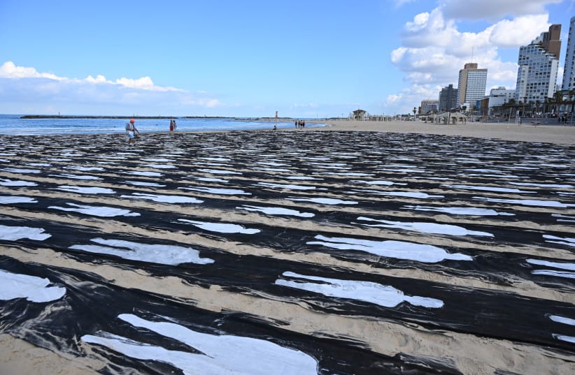 A public art installation on Trumpeldor Beach in Tel Aviv, commemorating the victims of October 7, on the third anniversary of the massacre, October 7, 2026. (credit: AVSHALOM SASSONI) A public art installation on Trumpeldor Beach in Tel Aviv, commemorating the victims of October 7, on the third anniversary of the massacre, October 7, 2026. (credit: AVSHALOM SASSONI)