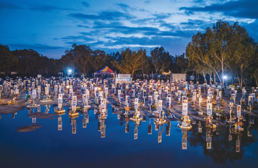 POSTERS MEMORIALIZING Nova victims, reflected after the rain.  (credit: FLASH90)