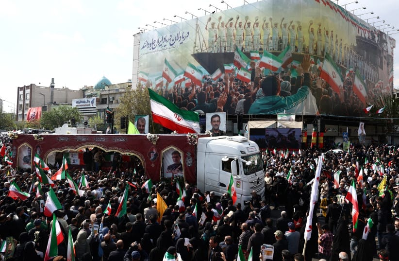 People attend a funeral ceremony for the Revolutionary Guards Navy Commander Alireza Tangsiri, who was killed in strikes, amid the U.S.-Israeli conflict with Iran, in Tehran, Iran, April 1, 2026. (credit: MAJID ASGARIPOUR/WANA (WEST ASIA NEWS AGENCY) VIA REUTERS)