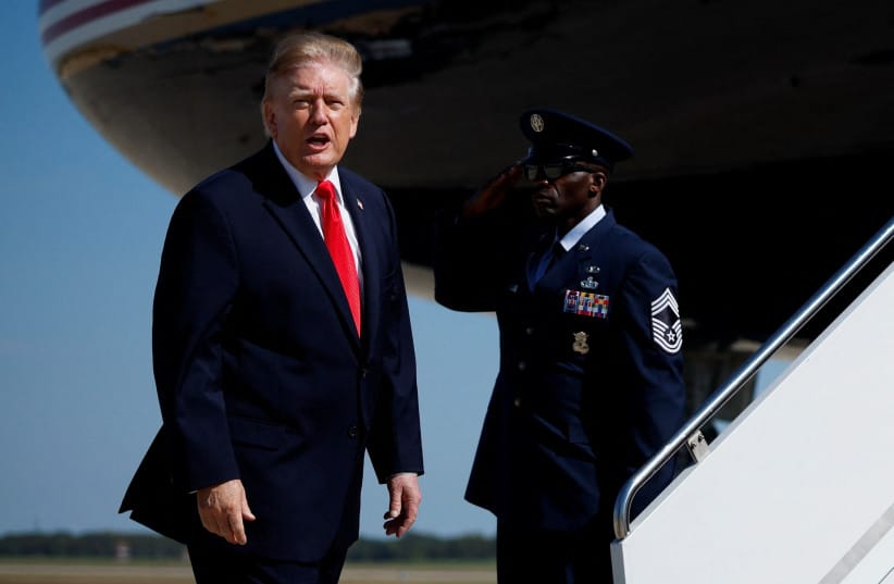 US President Donald Trump stands before boarding Air Force One for a trip to Alaska at Joint Base Andrews, Maryland, US, October 13, 2026 (credit: REUTERS/Evan Vucci) US President Donald Trump stands before boarding Air Force One for a trip to Alaska at Joint Base Andrews, Maryland, US, October 13, 2026 (credit: REUTERS/Evan Vucci)