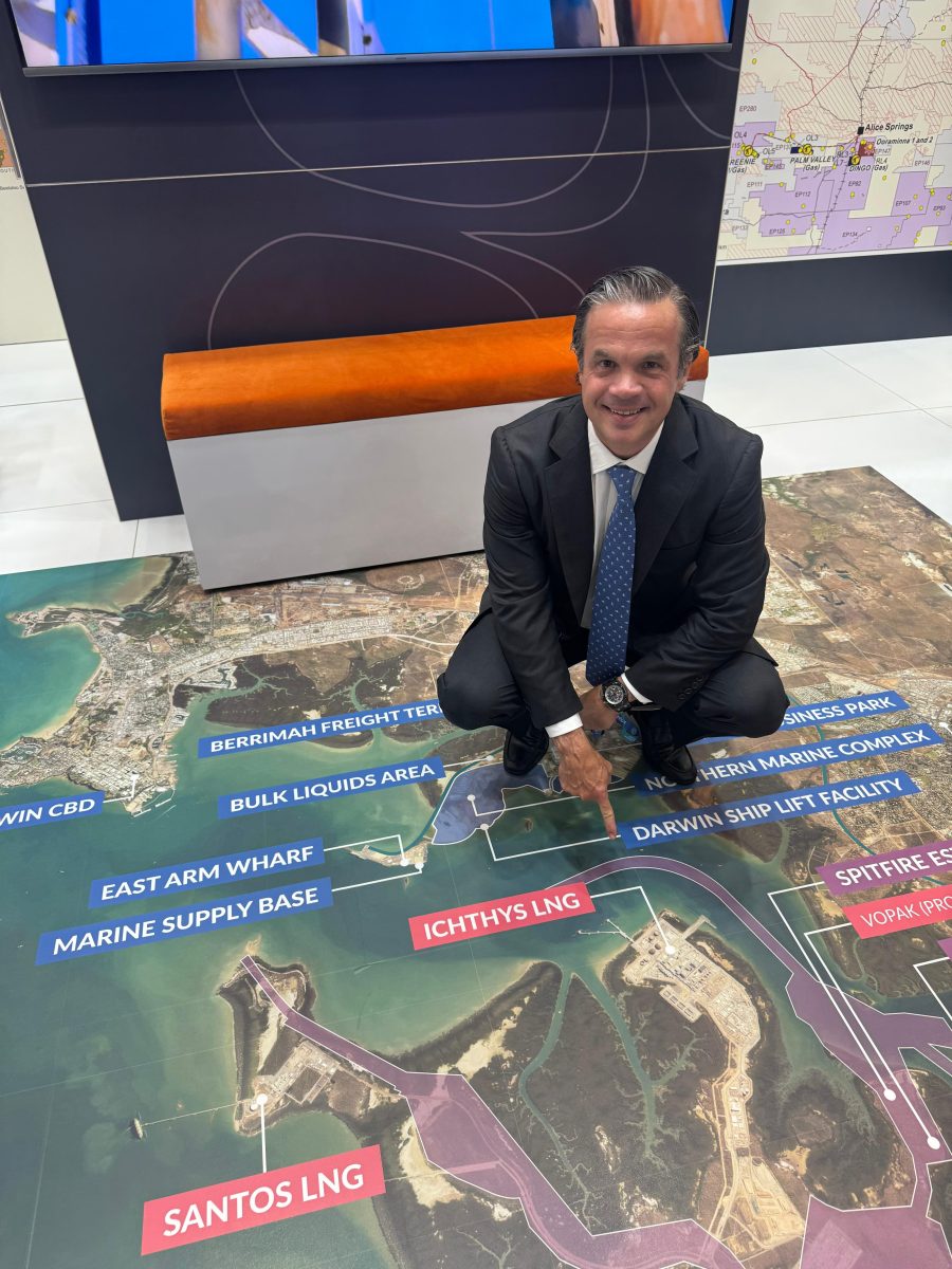 Formentera Partners and Daly Waters founder Bryan Sheffield crouches over a map of the liquefied natural gas export facilities in Australia that gas from the Beetaloo Basin could service.