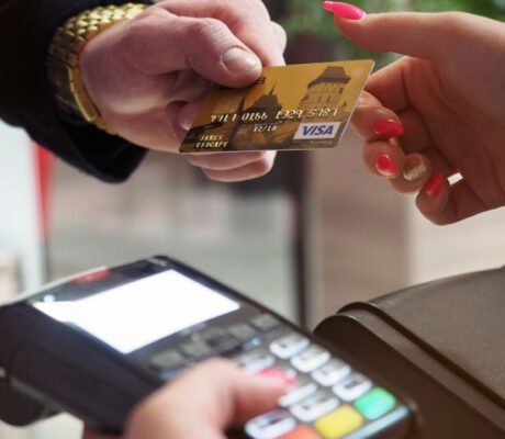 Archive photo of a card payment at a retail terminal, not identified as Adyen equipment
