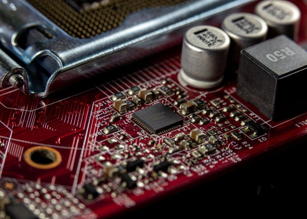 Electronic components on a computer motherboard. Illustrative archive, not identified as Panasonic products or an AIserver.