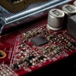Electronic components on a computer motherboard. Illustrative archive, not identified as Panasonic products or an AIserver.