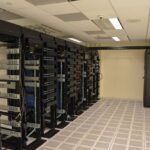 Rows of server racks in a data center