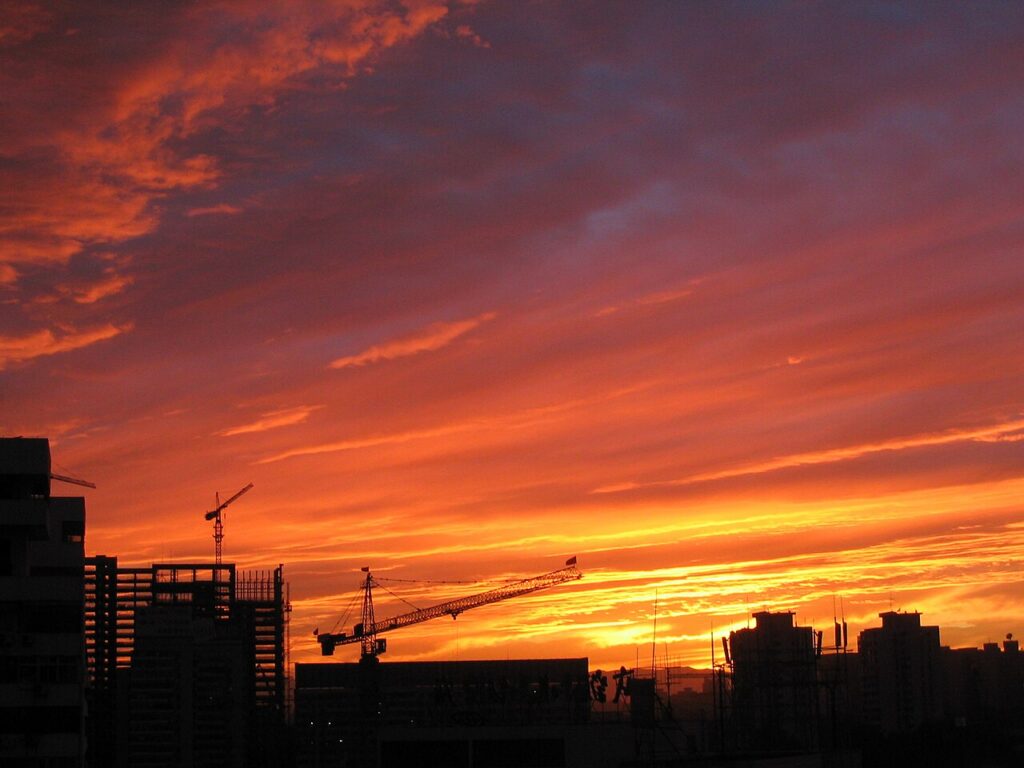 Silhouette of construction cranes and buildings in Beijing