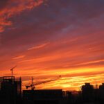 Silhouette of construction cranes and buildings in Beijing