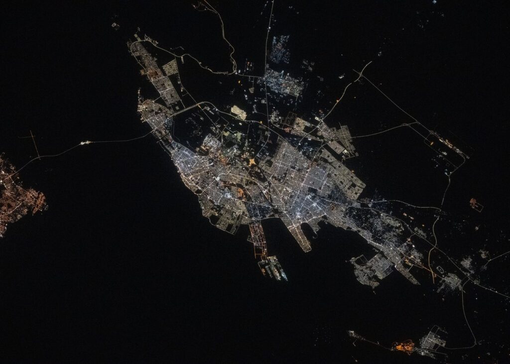 Archive NASA photograph of Dammam, Saudi Arabia, from the International Space Station, May 22, 2025; not the October 2026 missile incident.